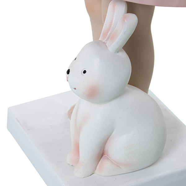 Estatueta de uma menina a segurar uma bandeja de valet