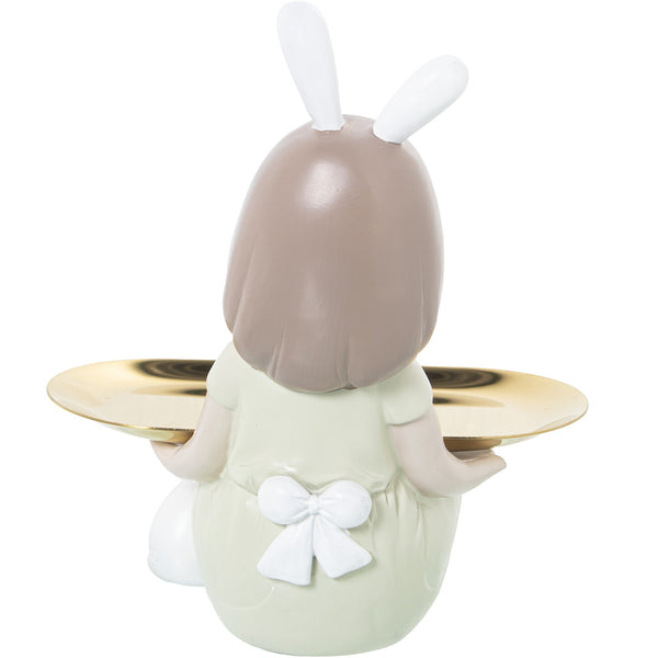 Parte trasera figura niña decorativa con lazo y bandeja dorada