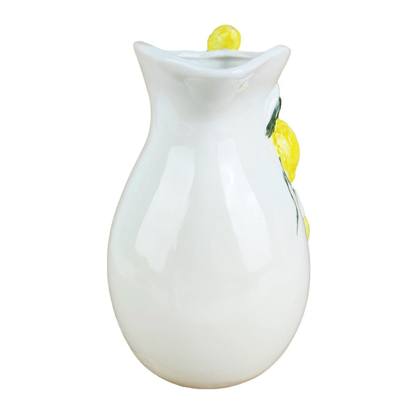 Vista frontal de jarra decorativa de porcelana con diseño de limones y acabado brillante.
