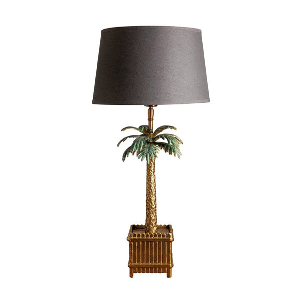 lámpara de sobremesa palmera dorada con pantalla gris