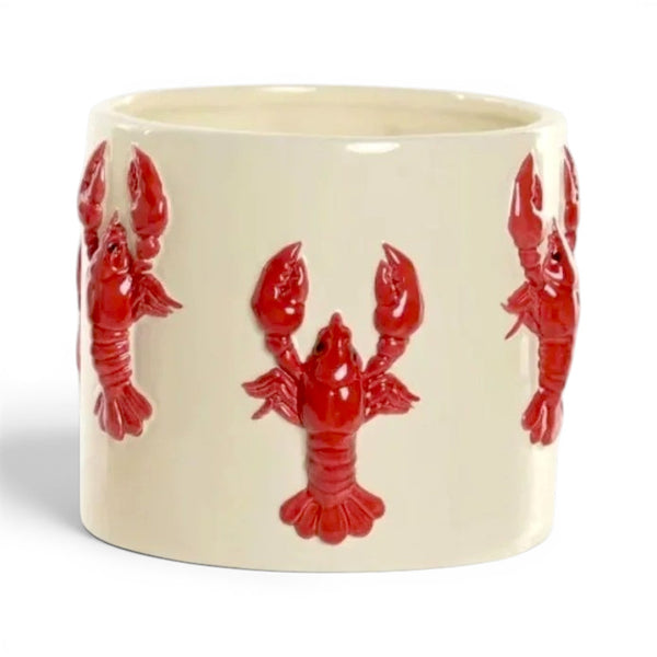 Macetero de cerámica color marfil con langostas rojas en relieve para decoración marinera.