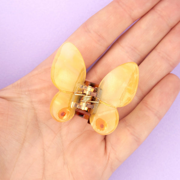 Mini gancho de cabelo em forma de borboleta amarela