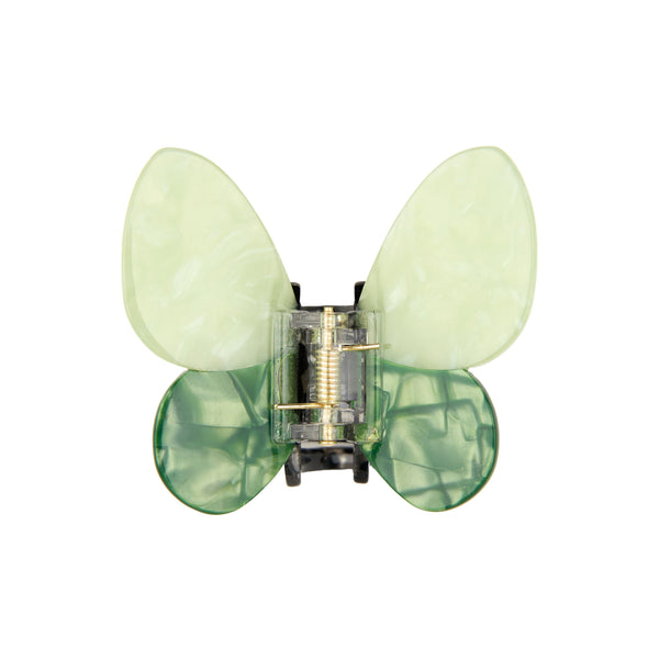 Pinza para el pelo mariposa verde Coucou Suzette vista frontal sobre fondo blanco