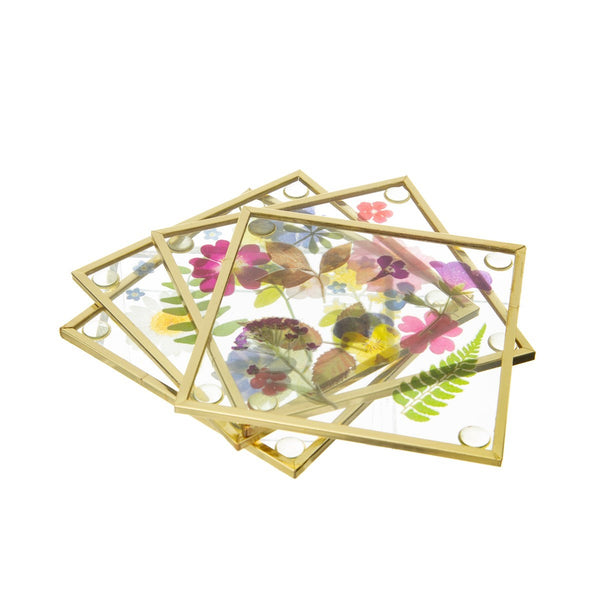 Conjunto de 4 porta-copos em forma de flor, feitos em metal e vidro.